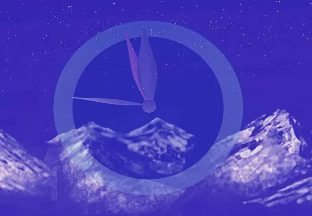 A clock on a mountain background.